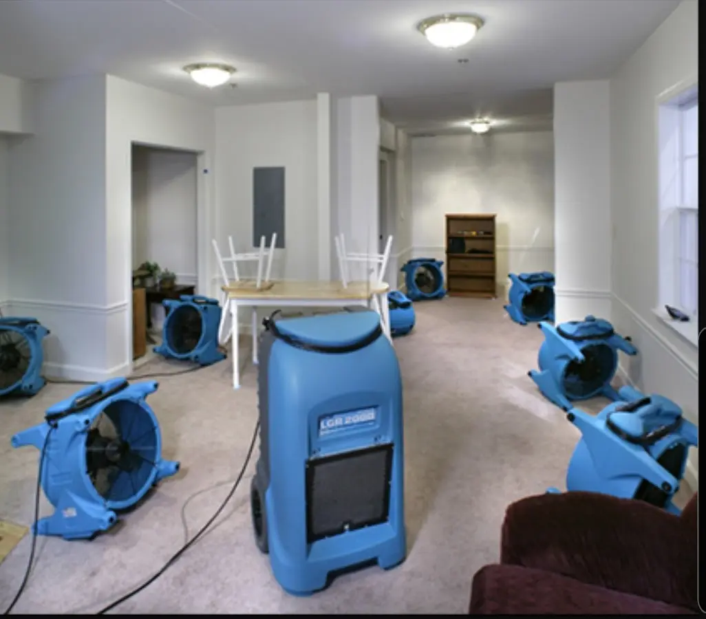 Air movers and dehumidifier setup for Water Damage Restoration in White Lake